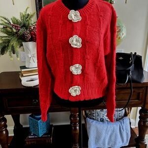 Red Sweater with Floral Accents